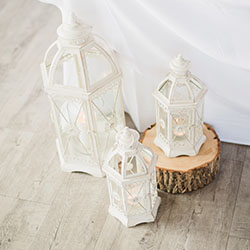 decorative lanterns on wood slabs